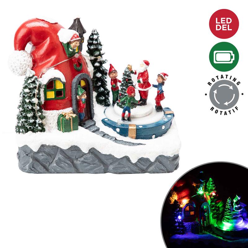 Scne en polyrsine avec chapeau de pre Nol avec lumires DEL et mouvement, 21 cm x 18,5 cm